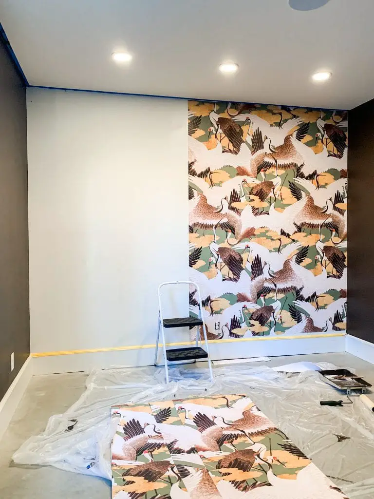 Apartment study wallpaper install with Cranes by Milton and King on Thou Swell #study #studydesign #apartmentdesign #apartment #wallpaper #wallpaperinstall #miltonandking #cranes