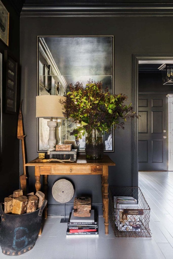 Moody dark grey hallway vignette side table with antiqued mirror on Thou Swell #grey #greywalls #greypaint #greyroom #vignette #interior #interiordesign