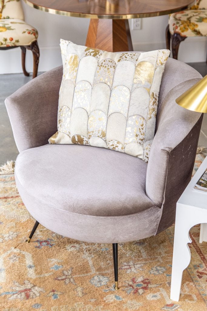 Modern living room accents from AllModern with cream velvet ottoman stools, grey velvet barrel chair, and vintage Turkish rug by Kevin O'Gara on Thou Swell #livingroom #livingroomdecor #modernaccents #allmodern #decor #homedecor #homedesign #livingroomdesign #interiordesign