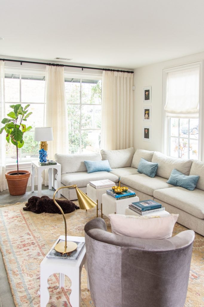 Modern living room accents from AllModern with cream velvet ottoman stools, grey velvet barrel chair, and vintage Turkish rug by Kevin O'Gara on Thou Swell #livingroom #livingroomdecor #modernaccents #allmodern #decor #homedecor #homedesign #livingroomdesign #interiordesign