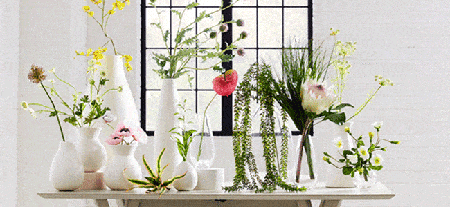 Faux flowers in white vases on Thou Swell #flowers #fauxflowers #artificialflowers #flowers