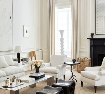 White living room design with layers of cream, tan, and black in New York townhouse with tall ceilings by Alyssa Kapito on Thou Swell #