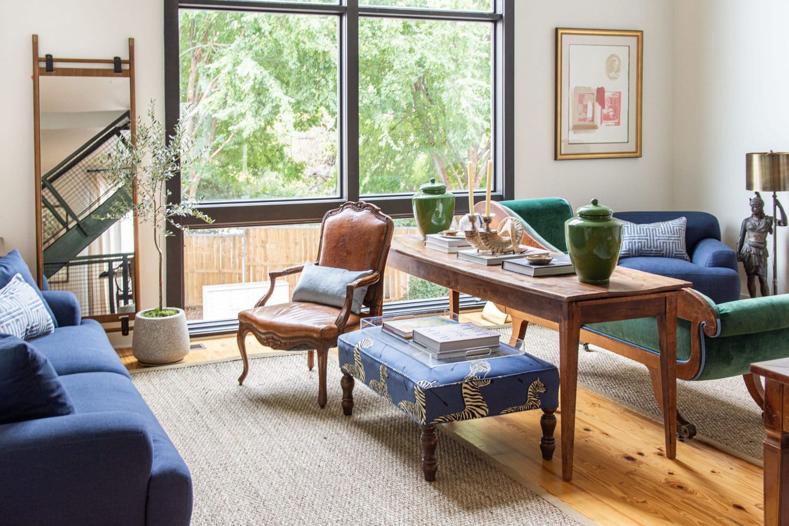 Modern living room design with blue sofa and armchair from Article, Abisko sofa and chair, navy blue sofa, townhouse design ideas by Kevin O'Gara on Thou Swell #article #myarticle #abiskosofa #bluesofa #moderndesign #livingroom #livingroomdesign #homedecor #homedecorideas