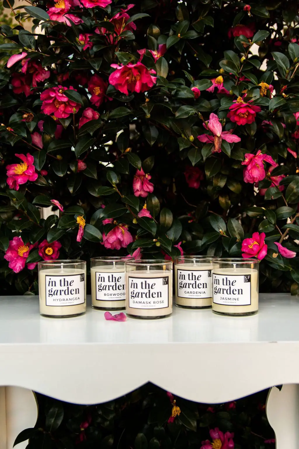 IN THE GARDEN scented candle collection inspired by the traditional Southern garden with boxwood, hydrangea, jasmine, damask rose, and jasmine by Kevin Francis Design #southerngarden #garden #gardening #candles #scentedcandle