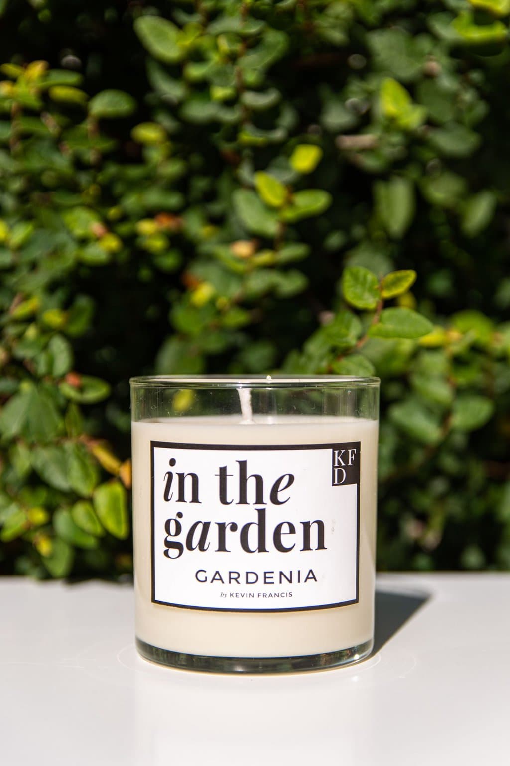 IN THE GARDEN scented candle collection inspired by the traditional Southern garden with boxwood, hydrangea, jasmine, damask rose, and jasmine by Kevin Francis Design #southerngarden #garden #gardening #candles #scentedcandle