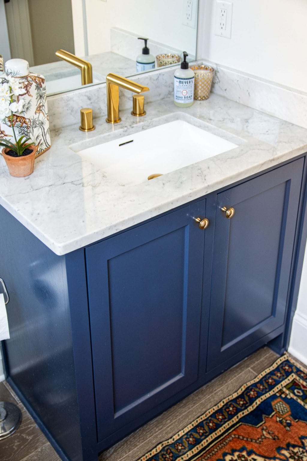 WILLIAMS PROJECT: POWDER ROOM UPDATE WITH THE GOLD PARABOLA FAUCET 10 Riobel brushed gold Parabola faucet by House of Rohl in powder room bathroom design on Thou Swell #bathroom #powderroom #powderbath #bathroomdesign #goldfaucet #sinkfaucet #homedesign #bathroomideas #renovation #houseofrohl