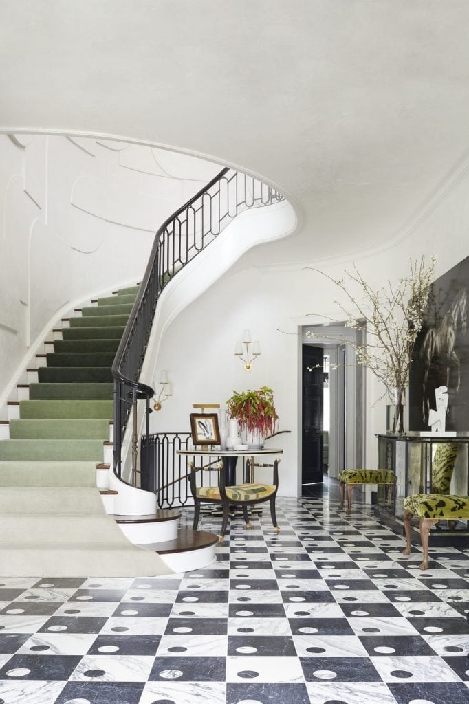 Curved staircase with green runner entryway in Ansley Park, Atlanta home tour renovation by Melanie Turner and Yong Pak classical family home with modern Art-Deco influences on Thou Swell #hometour #homedesign #atlanta #atlantahomes #southernhome #traditionalhome #artdeco #homedecor #homedecorideas #interiordesign #interiordesigner #designerhome