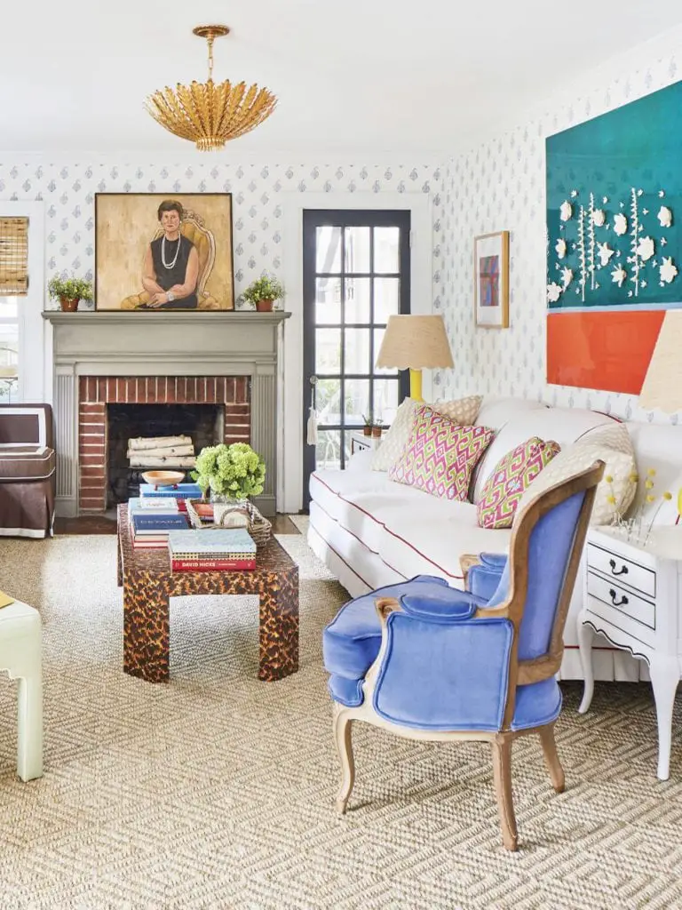 A cheerful, colorful living room design in Greenville, South Carolina - shop the home decor ideas on Thou Swell #colorfuldecor #colorfuldesign #livingroomdecor #livingroomdesign #livingroom #interiordesign #homedecorideas