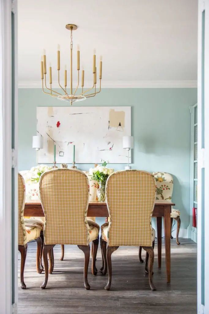 Clare Headspace, one of the prettiest light blue-green paint colors, airy blue dining room design by Kevin O'Gara #diningroom #paintcolors #blueroom #bluepaint #greenpaint #diningroomdesign #interiordesign #homedecorideas #homedecor