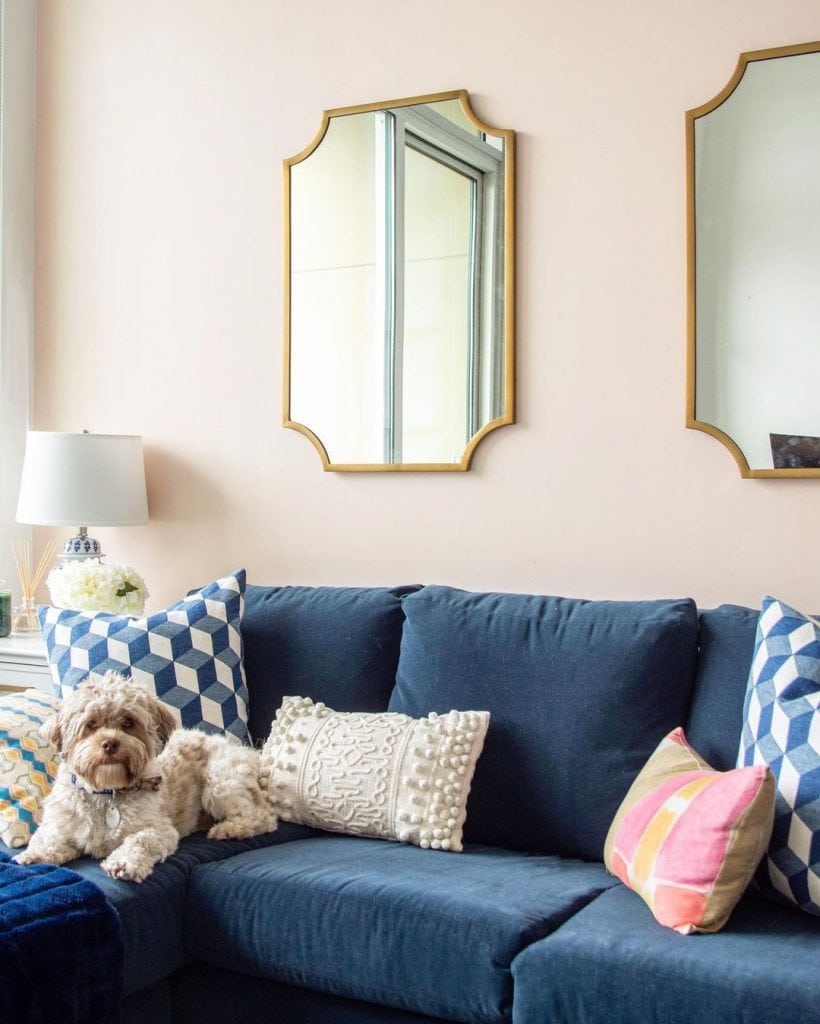 Clare Wing It pale pink paint color for walls in living room pink accent wall by Kevin O'Gara #clare #clarepaint #palepink #pink #pinkpaint #pinkwall #livingroom #interiordesign #homedesign