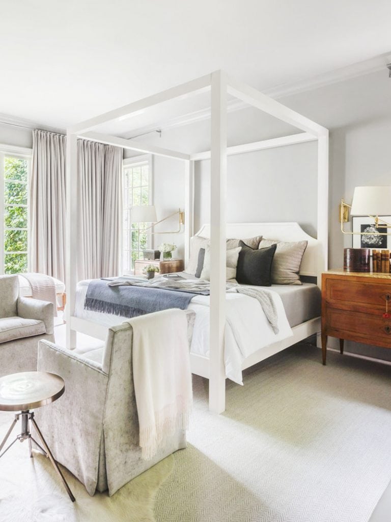 Soothing master bedroom with white canopy bed in elegant Memphis home tour on Thou Swell #hometour #housetour #traditionalhome #interiordesign #homedesign #homedecorideas #traditionaldesign #homedecor