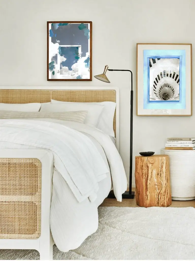 Blue and white collage art prints by Kevin Francis Design in a bedroom design with wicker bed #artprint #artwork #wallart 