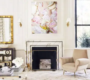 Flower photography art print above marble fireplace in cream living room design by Melanie Turner on Thou Swell #livingroom #livingroomdesign #artprint #flowers