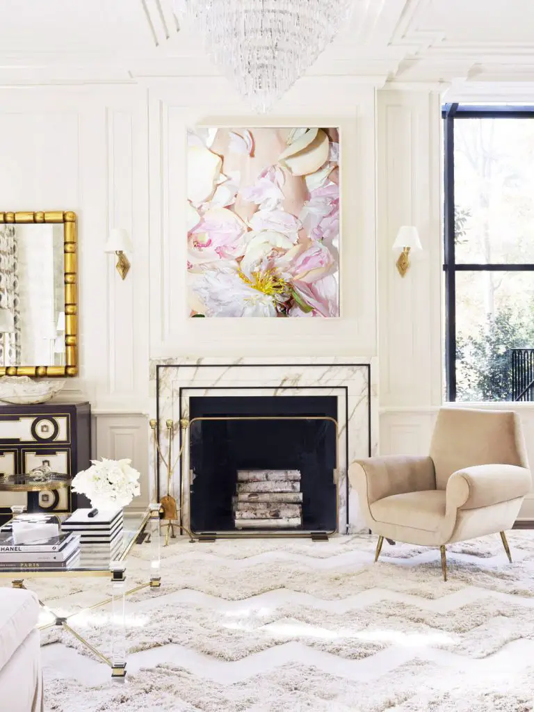 Flower photography art print above marble fireplace in cream living room design by Melanie Turner on Thou Swell #livingroom #livingroomdesign #artprint #flowers