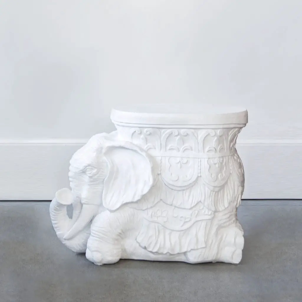 Matte white elephant side table, plaster style white stool table, elephant figurine stool table by Kevin Francis Design #elephant #whiteelephant #mattewhite #whiteplaster #sidetable #furniture #design
