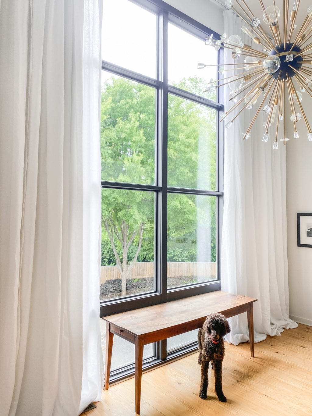 WEST MIDTOWN PROJECT: CUSTOM LINEN CURTAINS FOR THE LIVING ROOM 8 Custom tall sheer white linen curtains for double-story living room window on Thou Swell #curtains #drapery #linen #livingroom #livingroomdesign #livingroomdecor #homedecorideas