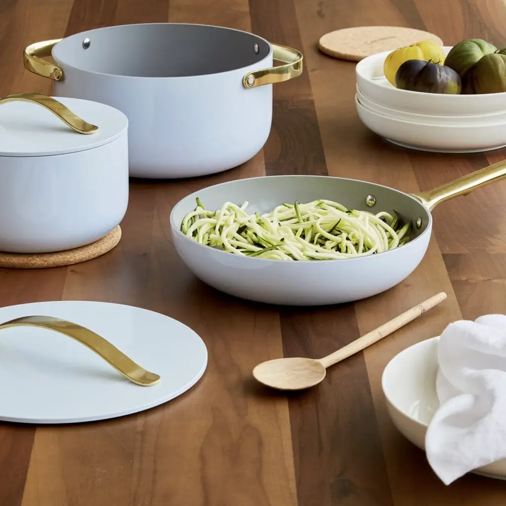 Caraway limited-edition full bloom pastel cookware with gold handles on Thou Swell #caraway #cookware #pastel #cooking #kitchen #kitchendesign