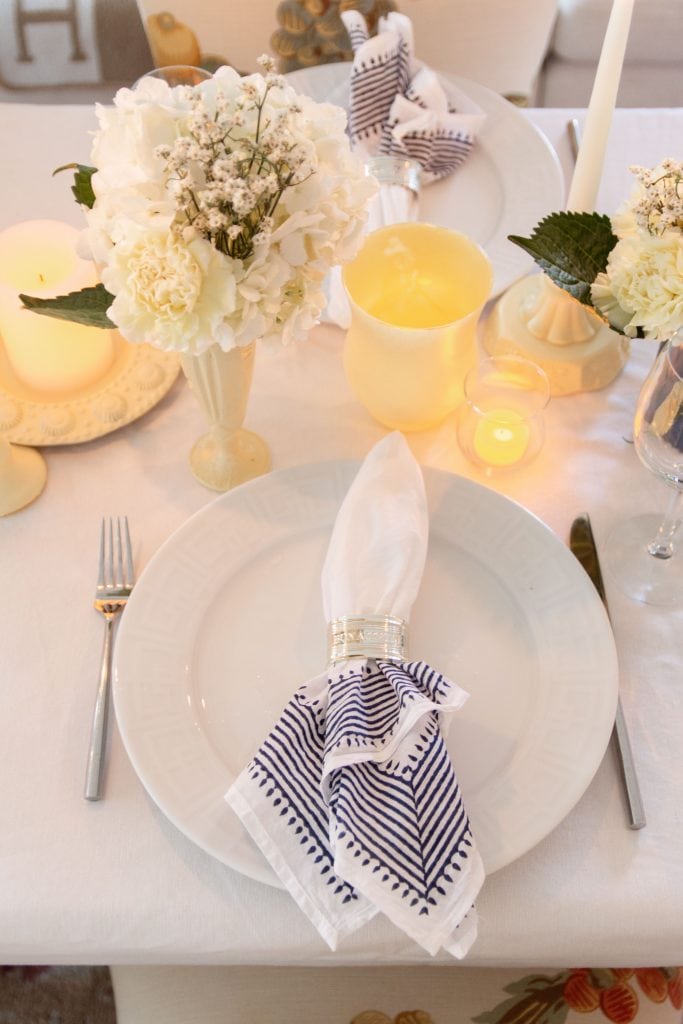 Glowy candlelit summer table setting with Phoenician Yellow PlastiDip peelable spray paint DIY project on Thou Swell #diy #diyproject #plastidip #spraypaint #yellowpaint #tablesetting #tablescape #dinnerparty