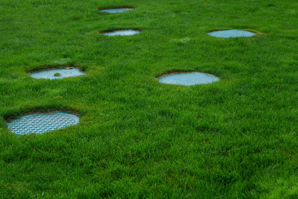 5 Creative Ways To Blend Sewer Covers With Your Garden