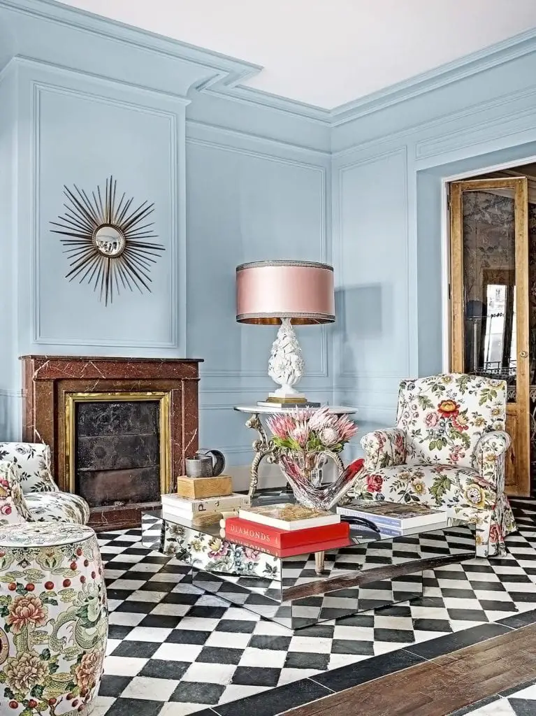 An exuberant blue living room in Spain by designer Jorge Vasquez, shop the look on Thou Swell #livingroom #livingroomdesign #spain #madrid #interiordesign #livingroomdesign #homedesign #homedecor